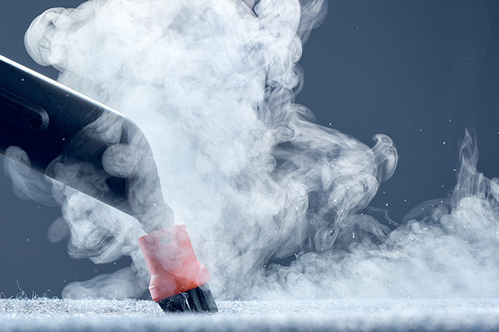 Close up of a carpet steam cleaner